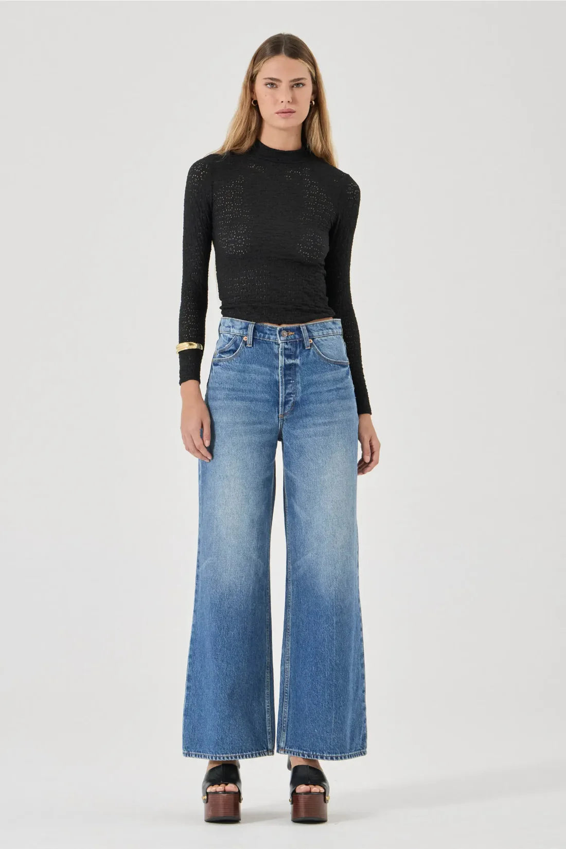 The Relaxed Sailor is a high-rise fit featuring a relaxed, A-line wide leg. Designed to sit loose and off the body, this long-length silhouette is finished with front scoop pockets and our signature spade back pockets with deck stitching