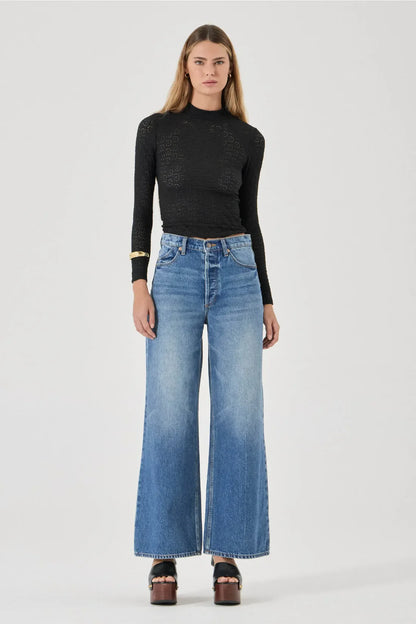The Relaxed Sailor is a high-rise fit featuring a relaxed, A-line wide leg. Designed to sit loose and off the body, this long-length silhouette is finished with front scoop pockets and our signature spade back pockets with deck stitching