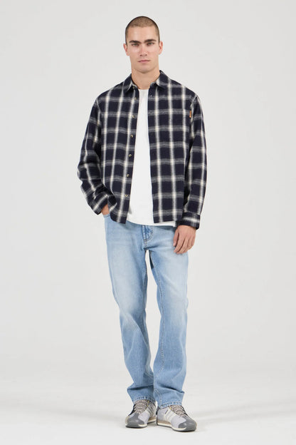 Long sleeve button-up shirt with classic front chest pocket
Lightweight soft hand feel
Mini check detailing
Made with 100% Cotton