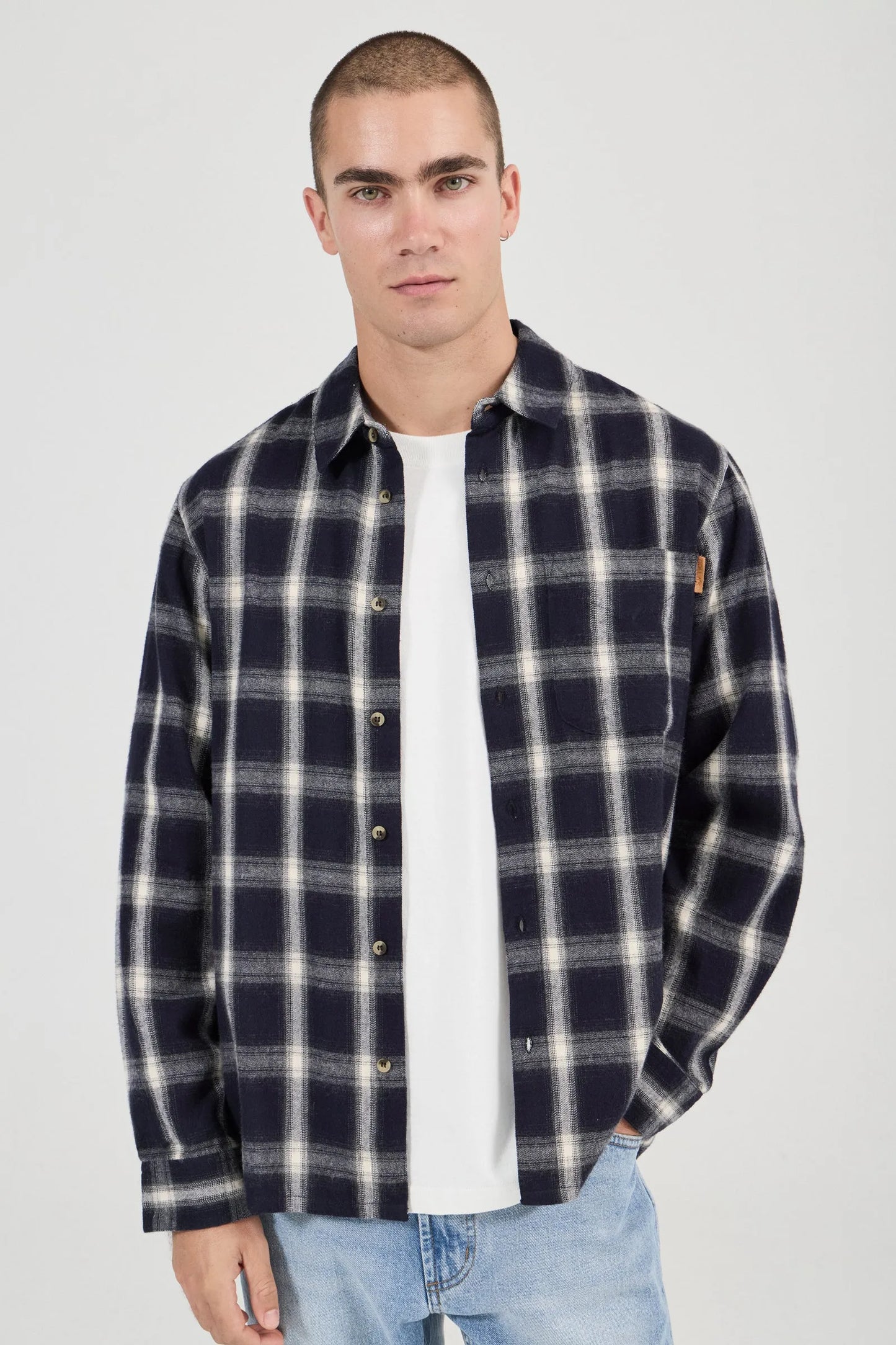 Long sleeve button-up shirt with classic front chest pocket
Lightweight soft hand feel
Mini check detailing
Made with 100% Cotton