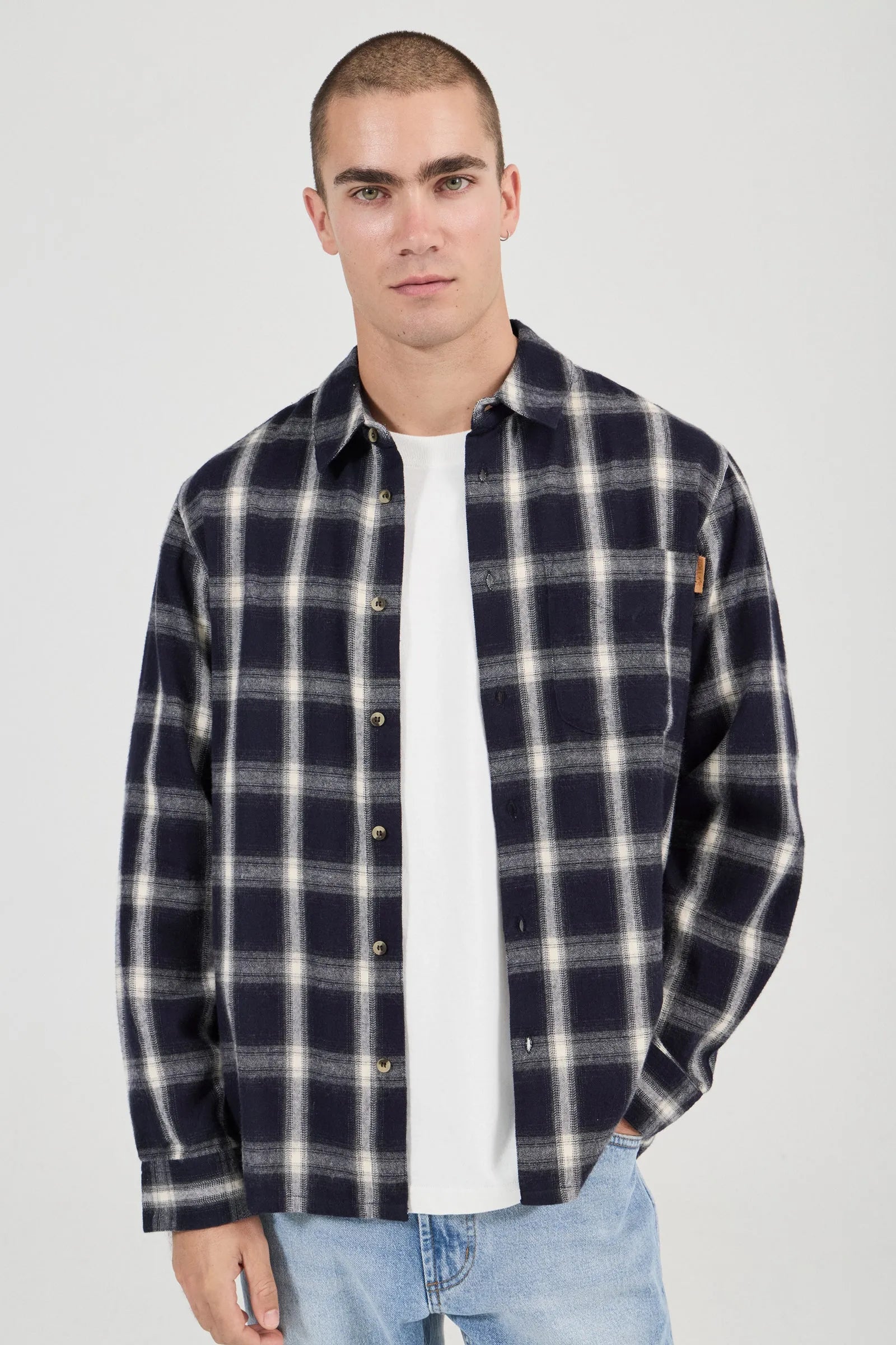Long sleeve button-up shirt with classic front chest pocket
Lightweight soft hand feel
Mini check detailing
Made with 100% Cotton