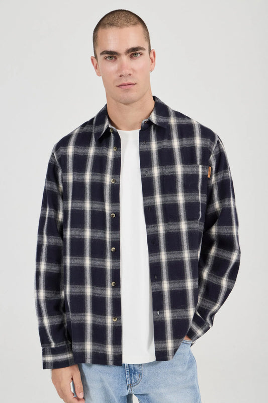 Long sleeve button-up shirt with classic front chest pocket
Lightweight soft hand feel
Mini check detailing
Made with 100% Cotton