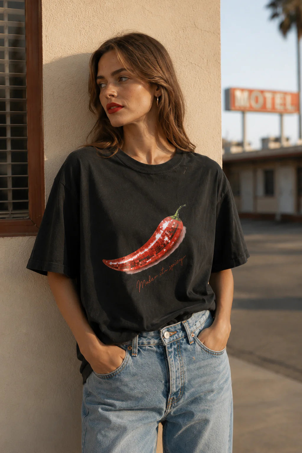 The Make It Spicy Tee is your throw-on-and-go statement piece — featuring an oversized relaxed fit and playful chilli graphic with a subtle retro feel. Crafted from soft 100% cotton in a washed black finish, it’s the kind of tee that looks even better styled back with lived-in denim, relaxed tailoring or cut-off shorts.

Designed with an effortless boyfriend-inspired silhouette, this tee is perfect half-tucked, layered or worn oversized for that undone cool-girl feel.

100% Cotton
Oversized relaxed fit
Vint