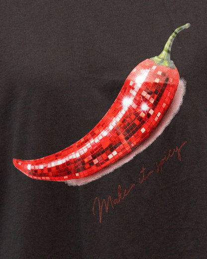 The Make It Spicy Tee is your throw-on-and-go statement piece — featuring an oversized relaxed fit and playful chilli graphic with a subtle retro feel. Crafted from soft 100% cotton in a washed black finish, it’s the kind of tee that looks even better styled back with lived-in denim, relaxed tailoring or cut-off shorts.

Designed with an effortless boyfriend-inspired silhouette, this tee is perfect half-tucked, layered or worn oversized for that undone cool-girl feel.

100% Cotton
Oversized relaxed fit
Vint