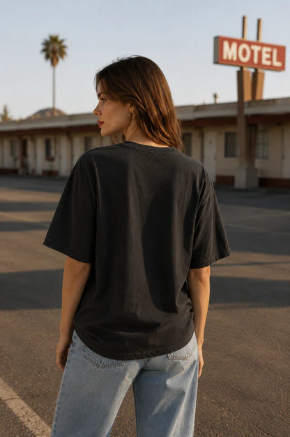 The Make It Spicy Tee is your throw-on-and-go statement piece — featuring an oversized relaxed fit and playful chilli graphic with a subtle retro feel. Crafted from soft 100% cotton in a washed black finish, it’s the kind of tee that looks even better styled back with lived-in denim, relaxed tailoring or cut-off shorts.

Designed with an effortless boyfriend-inspired silhouette, this tee is perfect half-tucked, layered or worn oversized for that undone cool-girl feel.

100% Cotton
Oversized relaxed fit
Vint