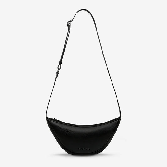 Usually having something glued to you would not be considered a good thing, however when it's holding all your valuables it's a different matter altogether. The 'Glued To You' bag features a wide opening main zip compartment with open pocket inside, branded gunmetal hardware and secret stash back zip pocket.


Soft shrunken pebble leather
Adjustable strap (34cm - 58cm)
Wide opening main pocket
Secret stash back zipper compartment
25.5cm x 13cm x 5.5cm
Strap width 3cm
Comes in a Status Anxiety soft material 