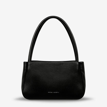 If you think about something in the cold light of day, you think about it clearly and calmly without emotion. In much the same way, the 'Light of Day' handbag isn't caught up with unnecessary, over the top design features. With its more structured form and thoughtful simplicity the LOD bag makes for the perfect day to night bag. With generous straps it can be comfortably worn over the shoulder or elbow and features a wide opening main compartment, with zipper pocket, open pockets, and clip for your keys.