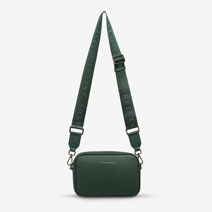 Plunder Bag With Dual Straps - Green - Status Anxiety 

Our best selling bag of all time now comes with two different straps for twice the versatility. Clip on the leather strap for dressier occasions, or the webbed strap for a more casual vibe. It's a no brainer.

Soft shrunken pebble leather
Comes with Leather Strap Thin & Web Strap Medium
Back slider pocket
Internal zipper pocket, and open pouch pockets
Zipper close
Custom Status Anxiety lining
Comes in a Status Anxiety branded drawstring bag