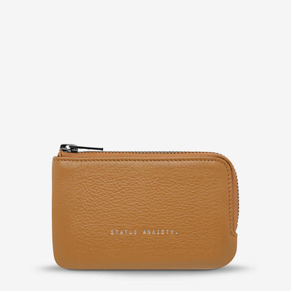 Sorry, it's no longer a thing... carrying a large wallet full of plastic cards, paper receipts and frequent sippers rewards cards. For those still there, this 'Left Behind' pouch could be your smooth transition into this century, with just enough space for a few important cards on the outside and some emergency cash, keys, and lip gloss (in case you see your ex on your morning walk) on the inside.