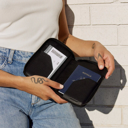 You know you're a real life grown up if you have a travel wallet. The 'Nowhere To Be Found' travel wallet is made of super soft shrunken pebble leather and designed to carry all your travel essentials yet still fit in your back pocket.