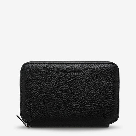 You know you're a real life grown up if you have a travel wallet. The 'Nowhere To Be Found' travel wallet is made of super soft shrunken pebble leather and designed to carry all your travel essentials yet still fit in your back pocket.