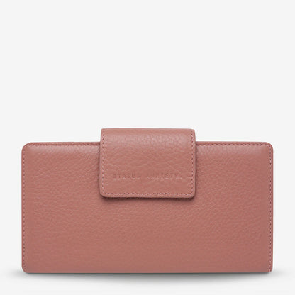 The slow and certain disintegration of what was, the Ruins wallet will handle all your essentials in its slim and compact silhouette. Comes with a large external zip pocket for easy access to loose change and a closure flap to keep everything securely stashed away.