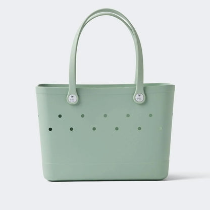 Secure yours before it sells out!

Dive into summer with the Tribe Bag in Sea Glass , a refreshing splash of cool blue-green, handpicked by our founder, Krystal, to reflect those dreamy ocean vibes. Whether you’re lounging by the water or conquering your family’s beach day, Sea Glass is here to make sure you do it in style. 

But it’s not just a pretty colour, the Tribe Bag is the waterproof beach bag that does it all. Roomy enough for everything you need for a day at the beach or a trip to the pool, its wa